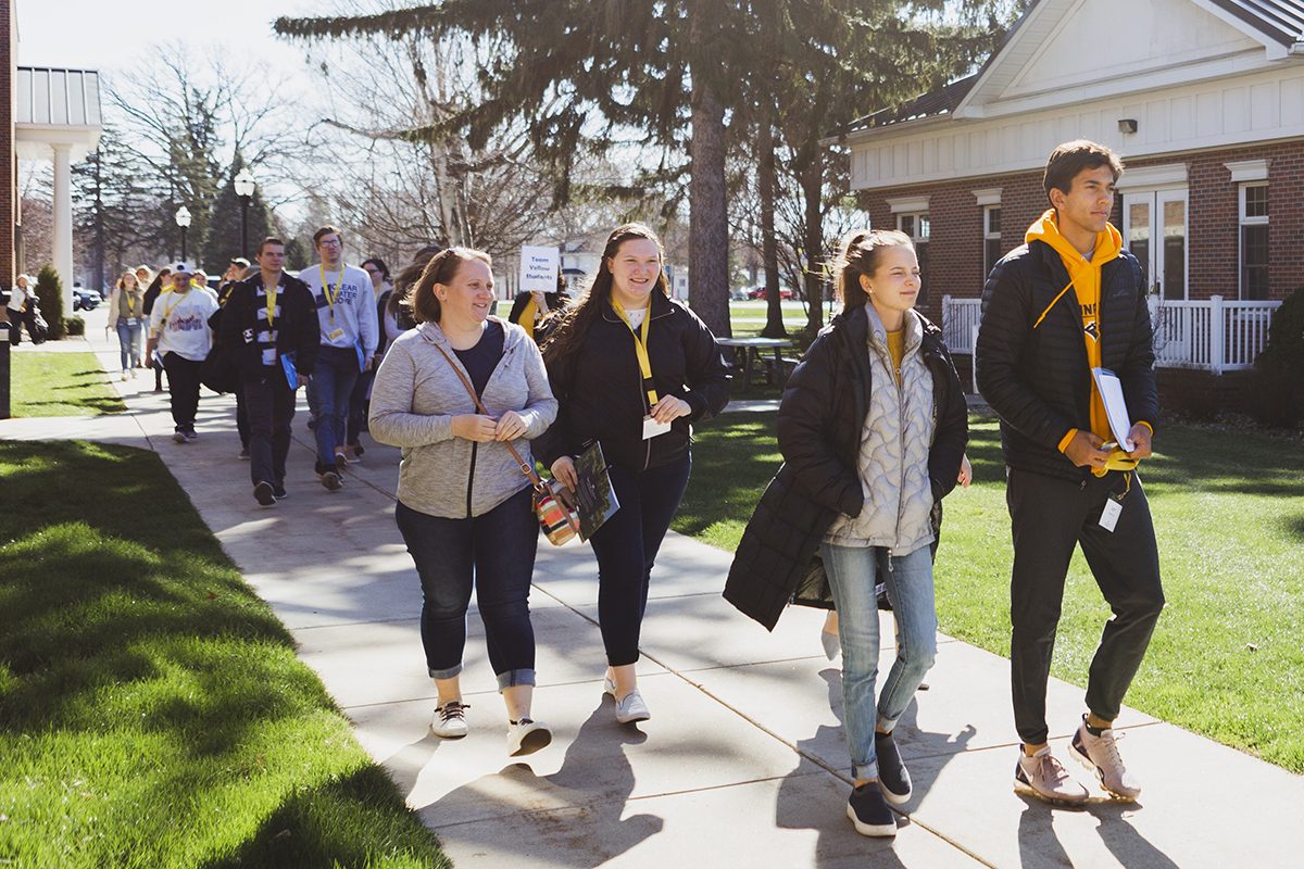 New students walking across campus to register for classes