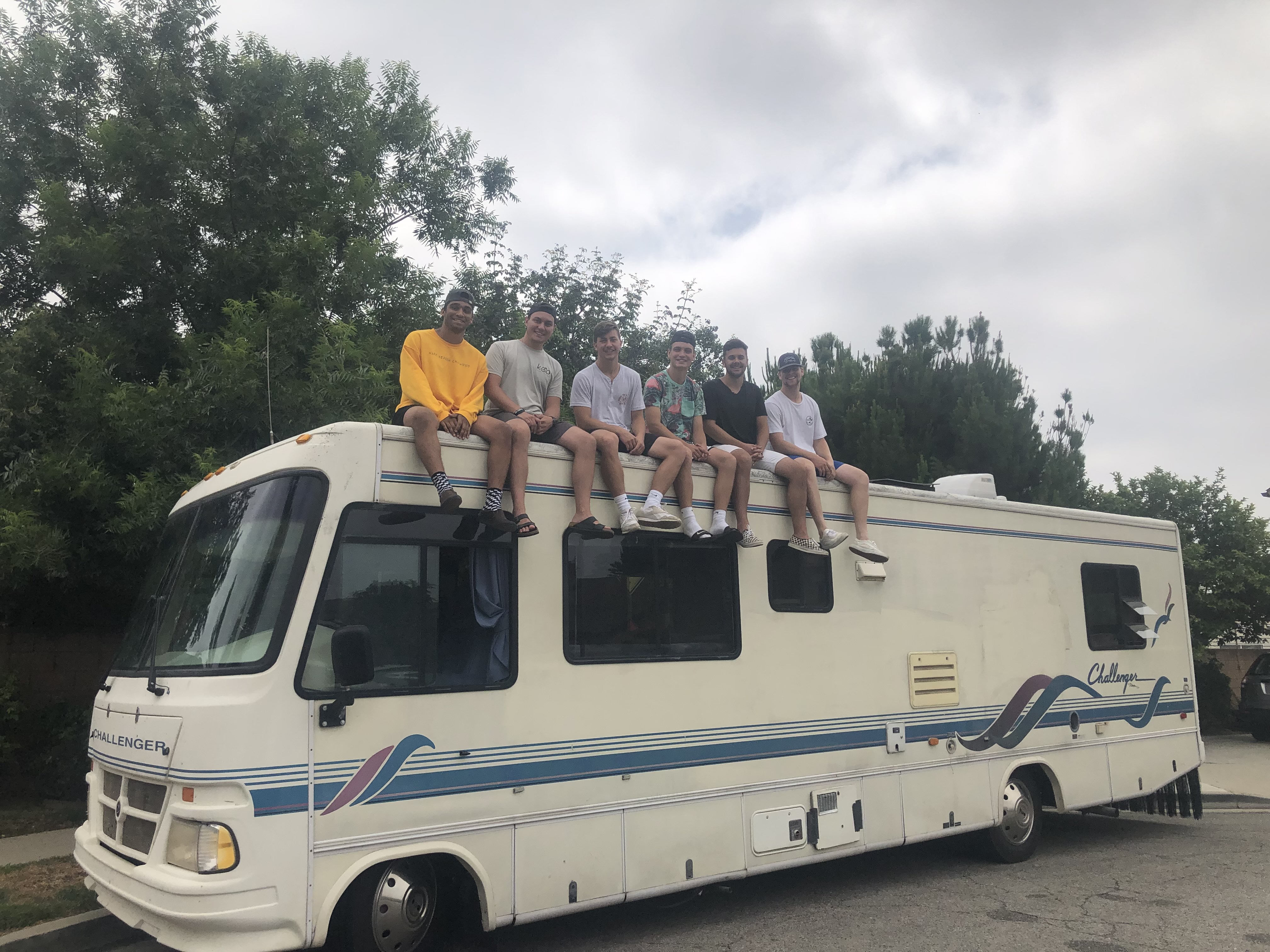 The students of EveryHeart Ministries pose atop their RV