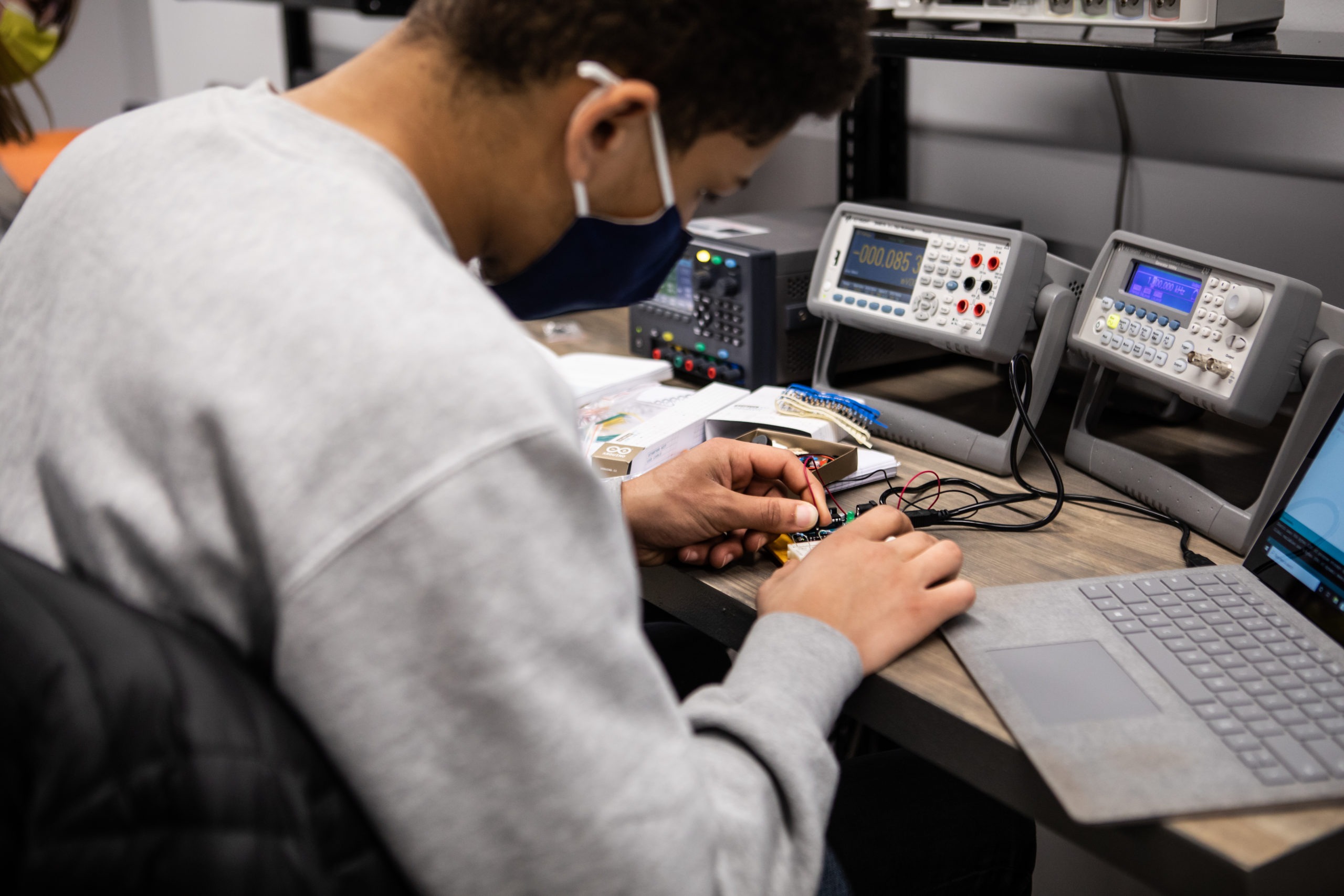 A student at work in SAU's engineering lab