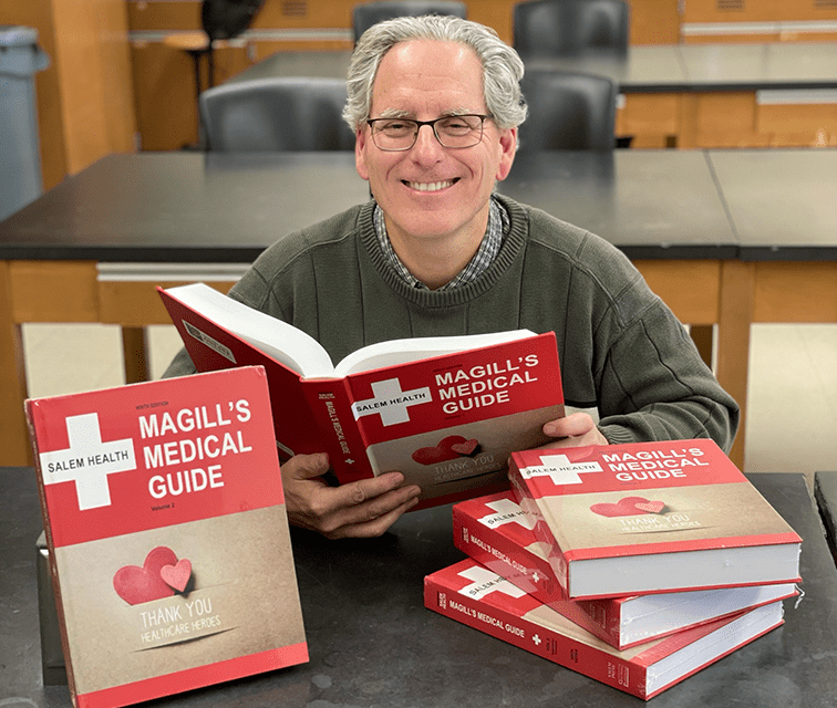 Professor Buratovich, Ph.D. co-edits a medical book used in schools