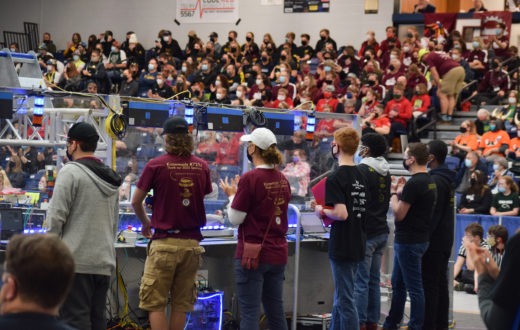 High school students competing at the FIRST Robotics Competition.