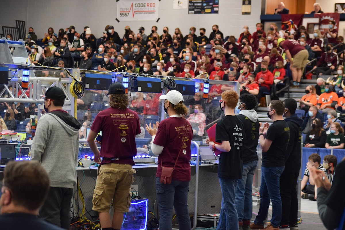 High school students competing at the FIRST Robotics Competition.
